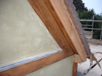 Ventilation duct penetration of air tightness / vapour control layer