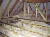 Loft floor raised platform supports. Insulation in progress